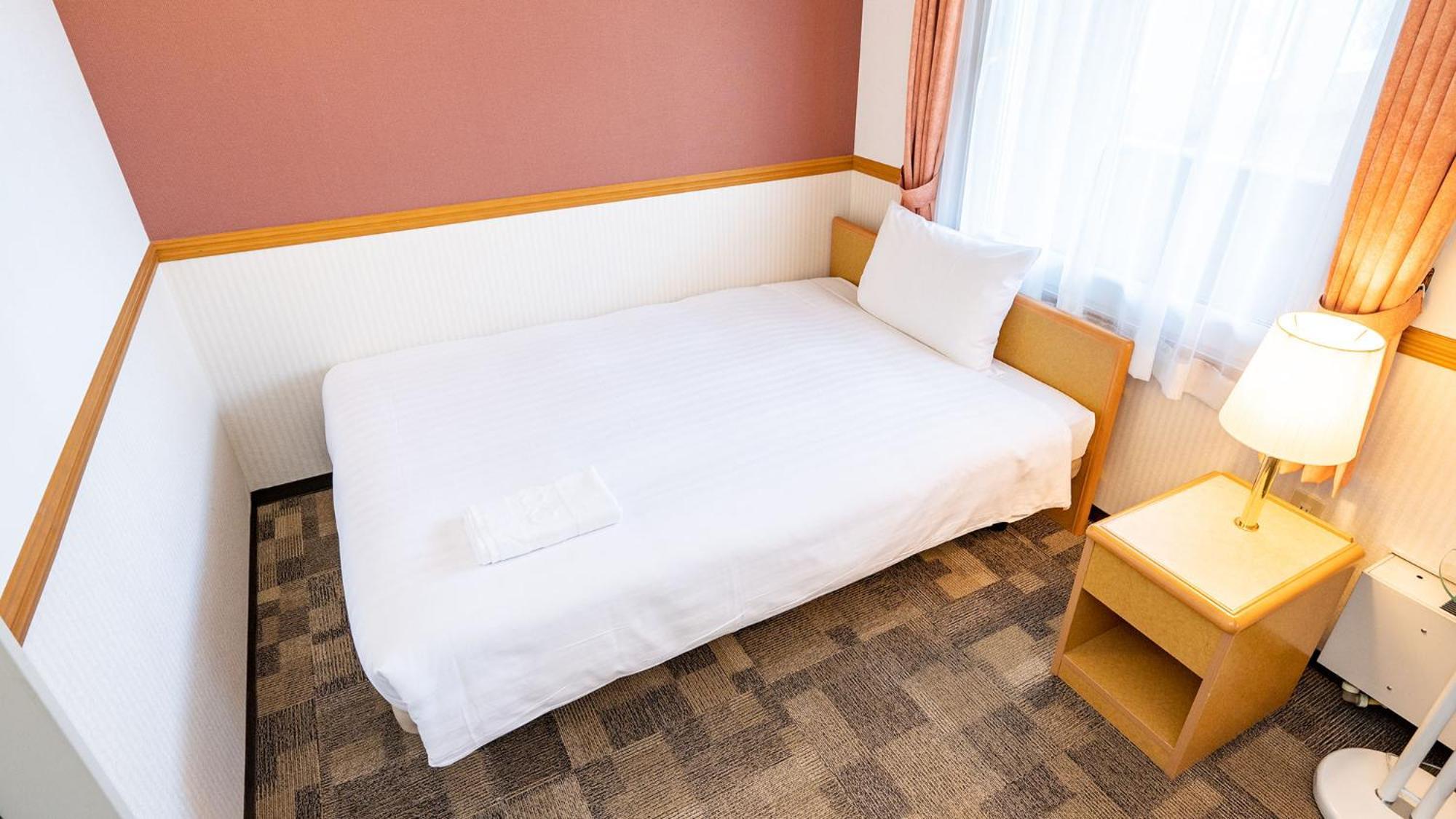 Toyoko Inn Nagoya Owari Ichinomiya Ekimae Szoba fotó